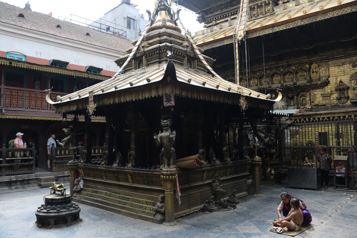 Golden Temple (Hiranya Varna Mahavihar) and child priest